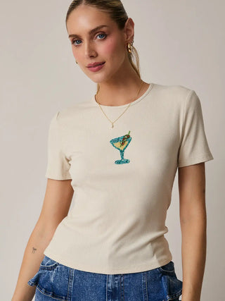 Front view of a ribbed, crop top featuring a detailed beaded martini glass graphic.