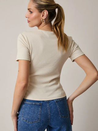 Back view of ribbed crop top showing smooth fabric and clean finish.