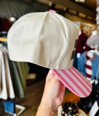 Enjoy The Little Things Trucker Hat - cream trucker hat side view showing structured panels and pink striped bill