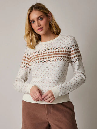 Model wearing cream fair isle fitted sweater with tan and brown pattern, front view