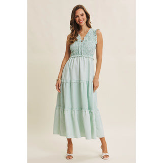 Spring midi dress with smocked top and functional pockets - full length view
