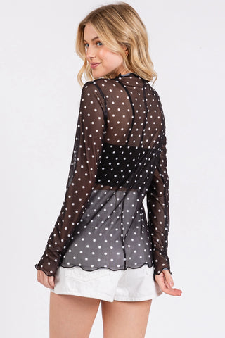 Back view of black polka dot sheer top with lightweight sheer detail