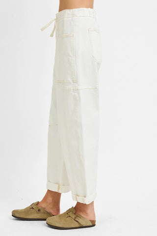 Side view showing relaxed barrel leg and seam detailing