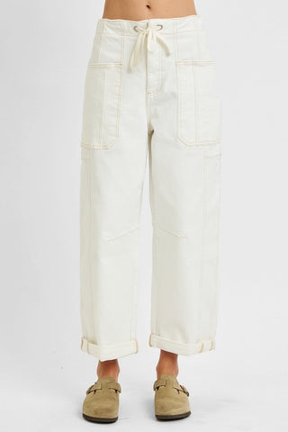 Front view of cream barrel jeans with drawstring waist and cuffed hem