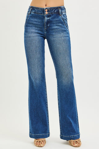 Front angled view of high rise flare jeans featuring a flattering double button waist and soft stretch denim.