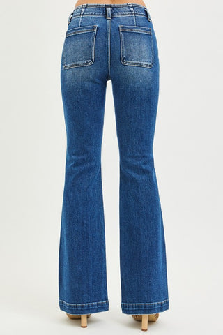 Back view of high rise flare jeans with classic back pockets and structured denim fit.