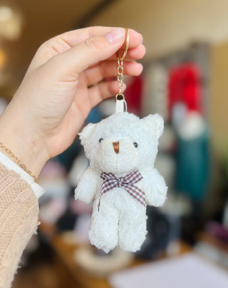 White teddy bear plush keychain with gingham ribbon bow and gold keyring