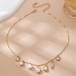 Delicate gold plated rhinestone charm necklace showing adjustable 16 inch chain with extender - hypoallergenic jewelry
