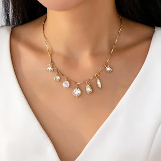 Gold plated charm rhinestone necklace with crystal, pearl and heart charms on delicate bar-link chain - adjustable layering necklace