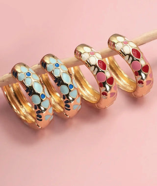 Colorful enamel flower huggie hoop earrings in gold plating with vibrant multi-color finish