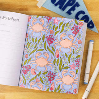 Coastal living coloring book page with patterns featuring crabs, seashells, and foliage by Elyse Burns
