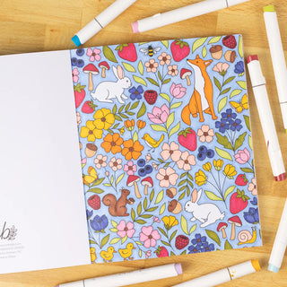 Hand-drawn botanical coloring page with lush garden landscape, flowering plants, and intricate floral illustrations for adult colorists
