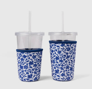 Elyse Breanne Design neoprene drink sleeve in porcelain floral pattern with delicate blue and white botanical design on coffee cup
