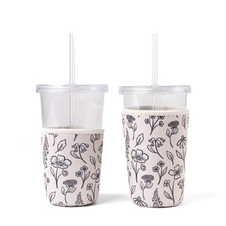 Elyse Breanne Design reusable coffee sleeve in pressed floral design with vintage botanical print on to-go beverage cup
