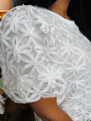 Close-up of the 3d floral print and bubble sleeve design of the Jenny 3D Floral Bubble Sleeve Top