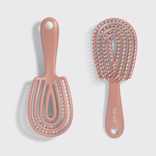 Close-up of ultra-smooth flexible bristles on Kitsch Mini Detangling Brush in Terracotta