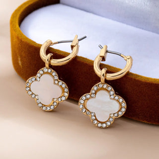 Mother-of-pearl four-leaf clover earrings with rhinestone detailing showing surgical steel post backs - lead and nickel compliant