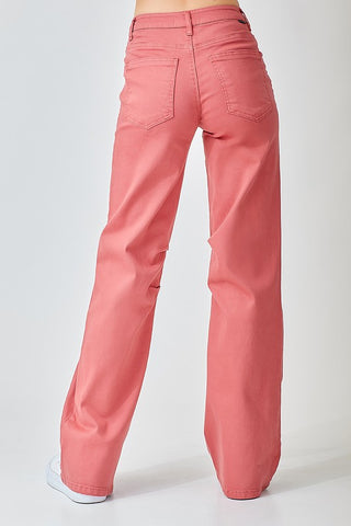 Back view of the Risen pair of high-waisted, wide straight-leg jeans in a brick color, featuring a front pork chop pocket detail.