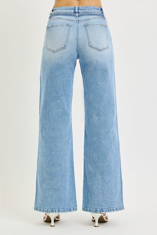 Back view of Risen high rise wide leg jeans in light wash – showing classic five-pocket styling, high rise waistband, and wide leg hem