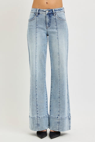 Risen mid rise ankle wide flare jeans in light wash – straight front view highlighting center seam pintuck design, tummy control waistband, and wide flare ankle hem