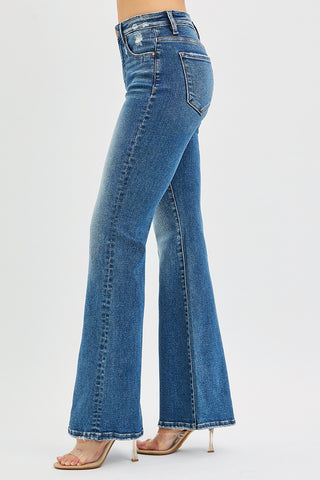 Risen Tummy Control High Rise Flare Jeans – side profile view highlighting high rise fit, tummy control, and flare leg in dark wash denim