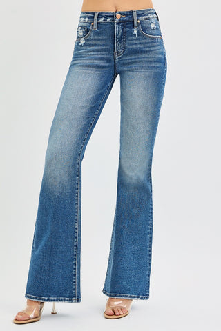 Risen Tummy Control High Rise Flare Jeans – front view dark wash denim with distressed pocket detail and wide flare leg