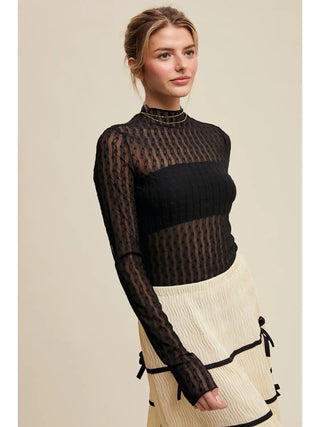 Side view of fitted semi sheer lace long sleeve top showing sleek silhouette and comfortable stretch fit